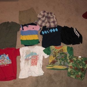 5 short sleeve shirts 3 shorts and 1 pair of pj’s